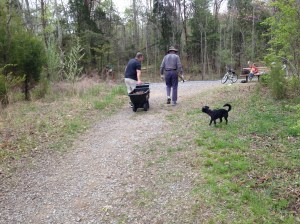 Bret helped Mr. Griffith haul the broken glass down the road to the trash.
